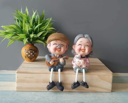 Amazon Brand - Umi Romantic Love Couple Dada Dadi Miniature Statue Showpiece for Home Decor and Gifts - Dada Dadi on Sofa